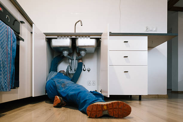 Professional Emergency Plumber technician working in Milford, CT